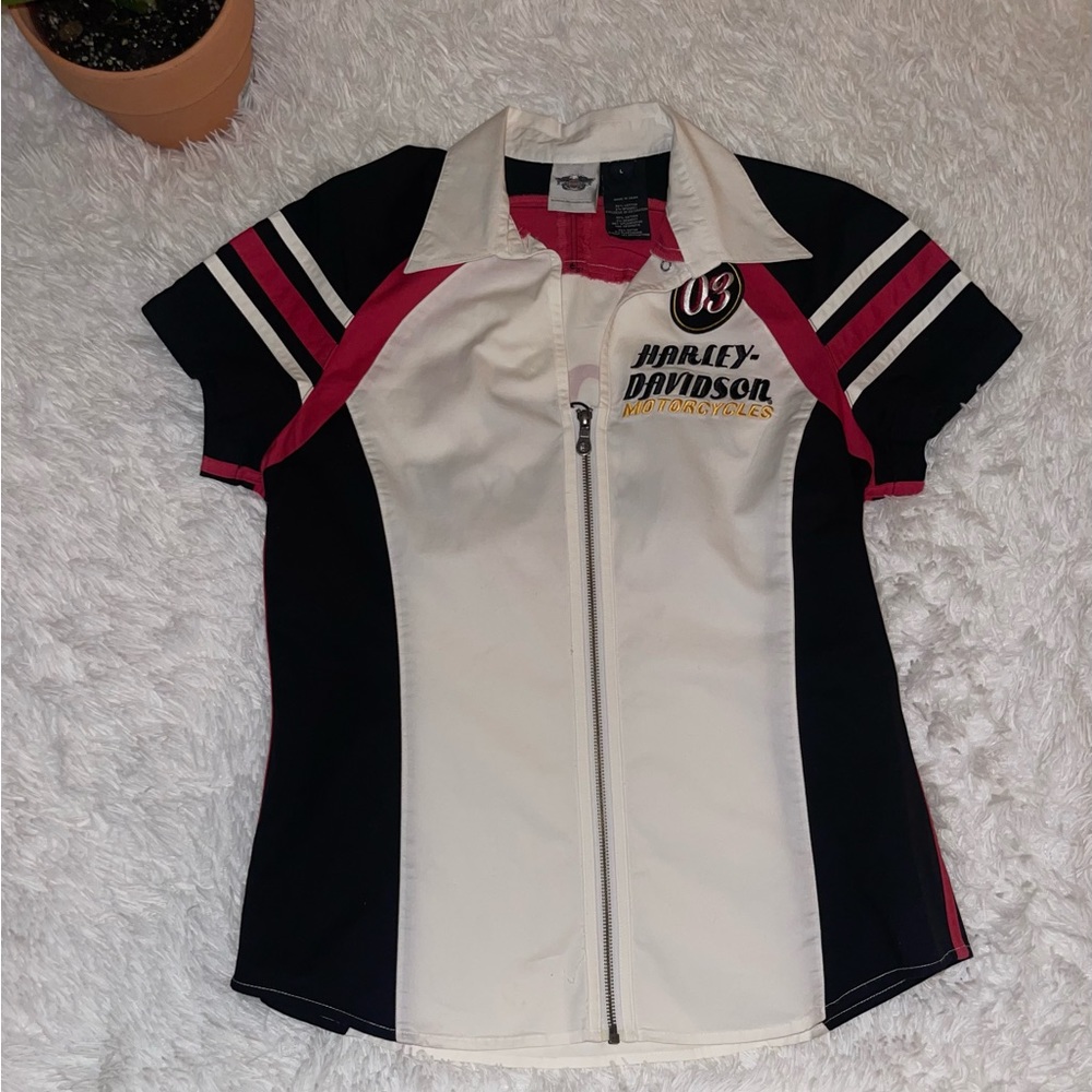 Woman’s Harley Davidson, genuine motor clothes, size large. One of a kind, new.